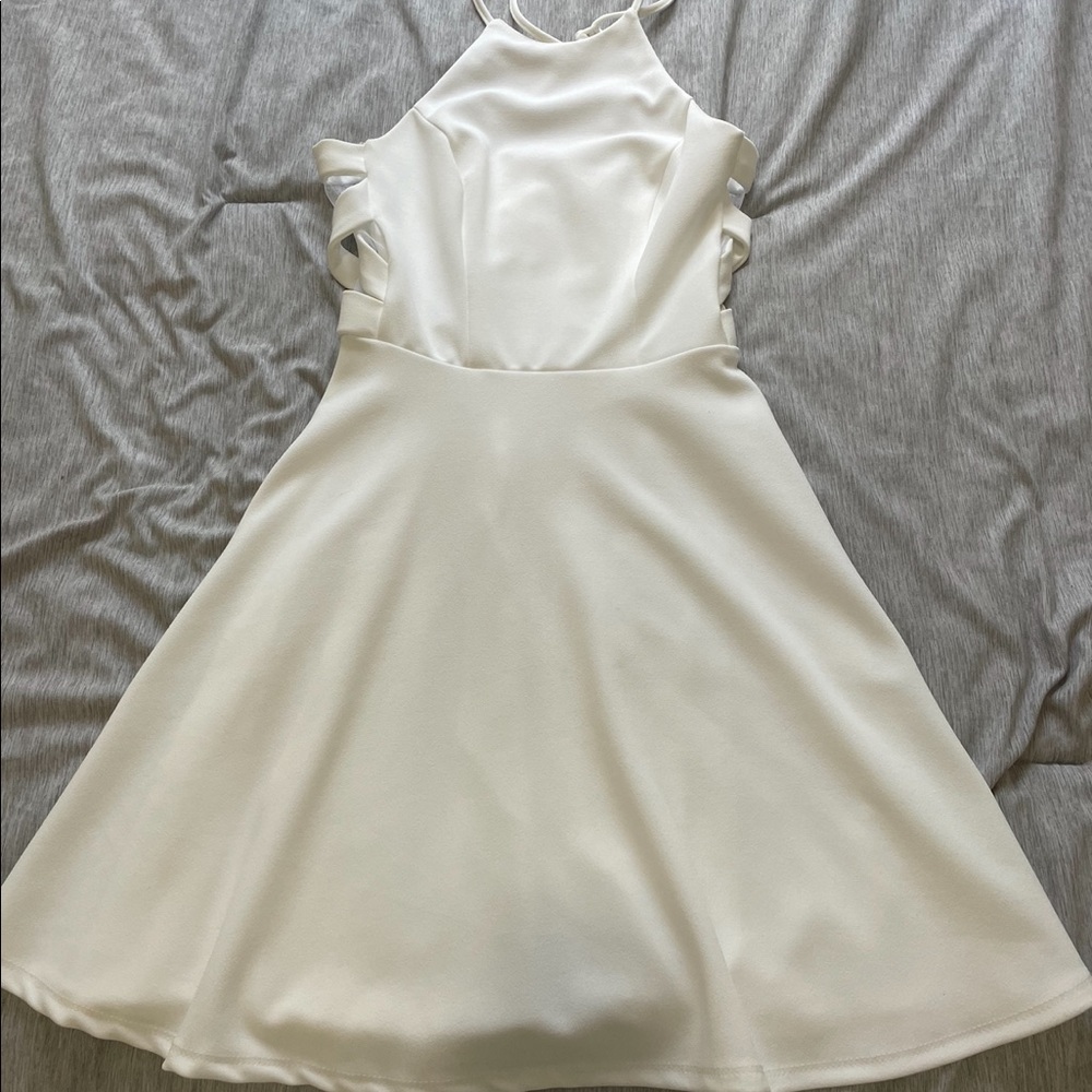 white elegant dress with mesh detailing.